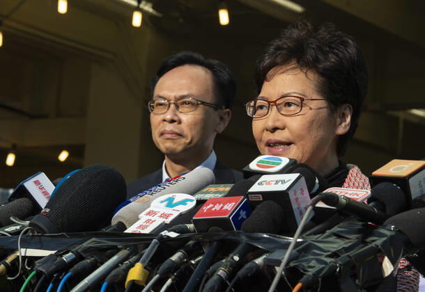 November 24, 2019, Hong Kong, Hong Kong SAR, China: Hong Kong Chief Executive, CARRIE LAM, votes in the local council elections. Lam meets the press at Raymond College in Midlevels Central to cast her vote in an election predicted to show Hong Kongers true views following 5 months of protests. Hong Kong China - ZUMAr144 20191124_zap_r144_021 Copyright: xJaynexRussellx