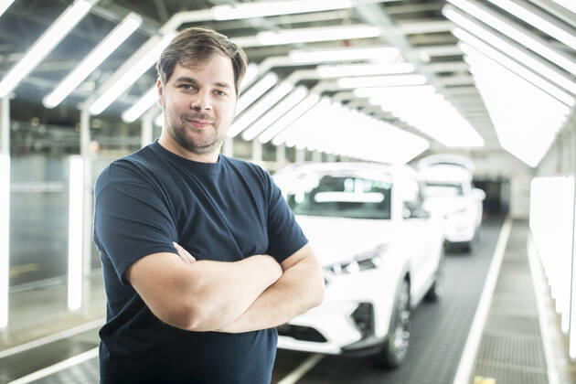 Portrait of confident worker in modern car factory model released Symbolfoto property released WESTF24399