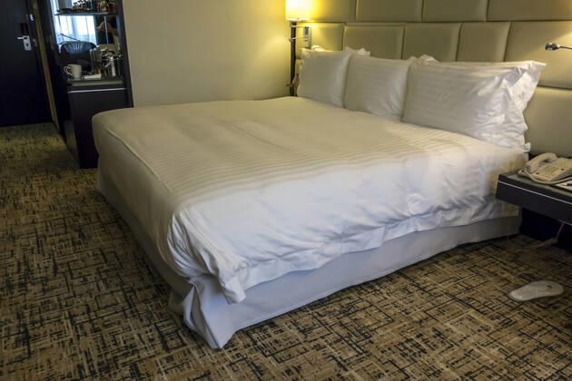 Luxury hotel room with king-size bed ,Hong Kong airport Copyright: xibphotox 11998804