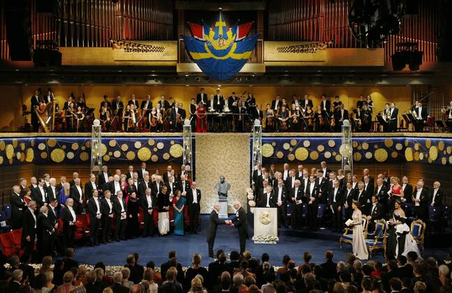 Japanese scientist Yoshino wins Nobel Prize Japanese scientist Akira Yoshino (C, L) accepts the Nobel Prize in chemistry from Swedish King Carl XVI Gustaf during a ceremony at Stockholm Concert Hall in the Swedish capital on Dec. 10, 2019. 