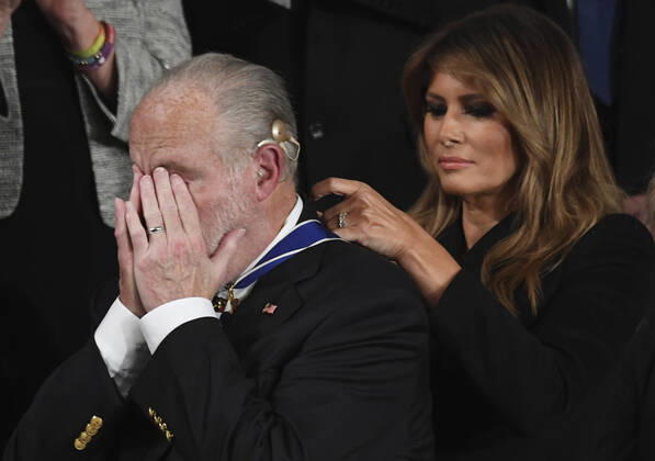 First Lady Melania Trump presents the Presidential Medal of Freedom to conservative commentator Rush Limbaugh as President Donald Trump delivers his State of the Union address to a joint session of Congress in the House Chamber of the U.S. Capitol in Washington, DC on Tuesday, February 4, 2020.  WAP20200204164 PATxBENIC