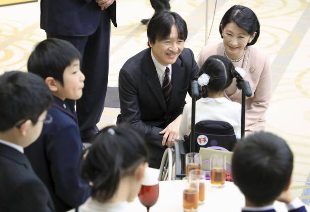 Japanese crown prince, princess at book report contest Japanese Crown Prince Fumihito (facing camera, L) and Crown Princess Kiko (R) talk to the winners of a book report contest for young people in Tokyo on Feb. 7, 2020, following the award ceremony. (Pool photo) 