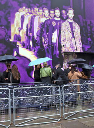 February 15, 2020, London, United Kingdom: People holding umbrellas outside the BFC Showspace during the London Fashion Week autumn winter 2020. London United Kingdom - ZUMAs197 20200215_zaa_s197_107 Copyright: xKeithxMayhewx