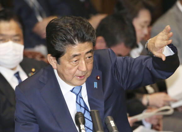 Japan PM Abe Japanese Prime Minister Shinzo Abe attends a House of Councillors Budget Committee session in Tokyo on March 3, 2020.
