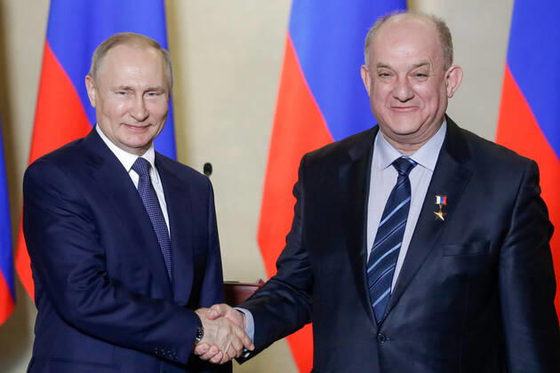 SEVASTOPOL, RUSSIA - MARCH 18, 2020: Russia s President Vladimir Putin (L) awards a Russian Hero of Labour gold star to SGM-Most General Director Alexander Ostrovsky for the construction of Kerch Strait Bridge, during a ceremony at the Konstantinovskaya Batareya Konstantin Battery Museum and Exhibition Centre. Mikhail Metzel TASS  TS0D2A31