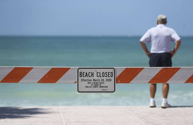 Bilder des Jahres 2020, News 03 März News Bilder des Tages March 21, 2020, Pass-A-Grille, Florida, USA: A look at the mostly empty beach with the beach closed sign and burricade near the steps leading down to the sand on Saturday, March 21, 2020 at Pass-a-Grille. Pinellas County beaches are now closed. Pinellas County announced that all public beaches closed starting onSaturday. Pass-A-Grille USA - ZUMAs70_ 20200321_zan_s70_009 Copyright: xDirkxShaddx