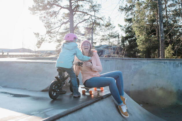 mom and her daughter laughing whilst playing in a skatepark NorrtoÂ¤lje, Stockholm County, Sweden ,model released, Symbolfoto CR_RABE200227-297979-01