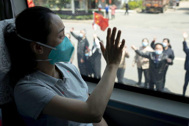 (200415) -- WUHAN, April 15, 2020 -- Citizens bid farewell to medics from the Peking Union Medical College Hospital in Wuhan, capital of central China s Hubei Province, April 15, 2020. The last medical assistance team started leaving Hubei Province Wednesday as the COVID-19 epidemic in the hard-hit province has been subdued. The medical team consisting of over 180 medical workers from the Peking Union Medical College Hospital arrived in the provincial capital of Wuhan on Jan. 26. ) CHINA-HUBEI-WUHAN-LAST MEDICAL ASSISTANCE TEAM-LEAVING (CN) XiongxQi 