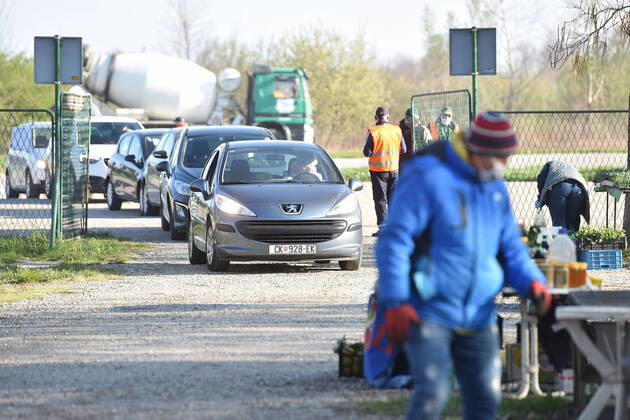 Drive-thru market in Cakovec, Croaita 15.04.2020., Cakovec, Croatia - People buy food without getting off the car at a drive-thru market in Cakovec, Croatia. VjeranxZganecxRogulja PIXSELL