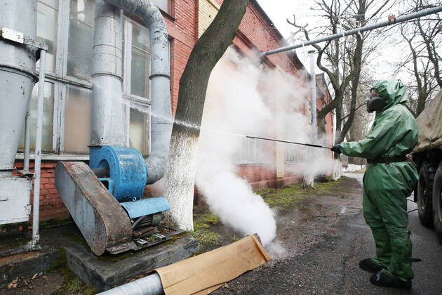 ST PETERSBURG, RUSSIA - APRIL 15, 2020: A serviceman of the Russian Nuclear, Biological and Chemical Defence Troops disinfects facilities at a factory of Metrovagonmash, a manufacturer of metro carriages. Peter Kovalev TASS  TS0D5CC0