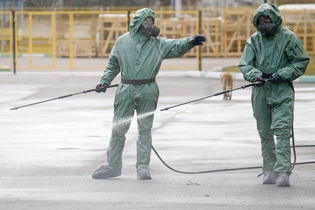 ST PETERSBURG, RUSSIA - APRIL 15, 2020: Servicemen of the Russian Nuclear, Biological and Chemical Defence Troops disinfect facilities at a factory of Metrovagonmash, a manufacturer of metro carriages. Peter Kovalev TASS  TS0D5D12