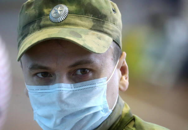 MOSCOW REGION, RUSSIA - APRIL 15, 2020: A serviceman of the extra-departmental security of Russia s Federal National Guard Service (Rosgvardia) before donating blood during a blood donating campaign titled From Heart to Heart in a gym at the Moscow Region Main Directorate of Russia s Federal National Guard Service (Rosgvardia) in the town of Reutov. The campaign is organized by medical brigades of a special medical complex fitted with air disinfection equipment. Sergei Fadeichev TASS  TS0D5CCC