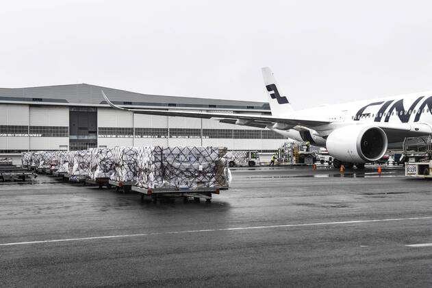 Workers unload a Finnair cargo plane which arrived from China with medical equipment needed against the novel coronavirus at the Helsinki-Vantaa Airport in Vantaa, Finland on April 15, 2020. Vantaa Finland  Copyright: xEmmixKorhonenx LKKTH20200415142640NXUX