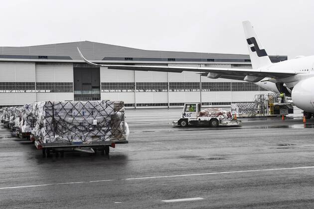 Workers unload a Finnair cargo plane which arrived from China with medical equipment needed against the novel coronavirus at the Helsinki-Vantaa Airport in Vantaa, Finland on April 15, 2020. Vantaa Finland  Copyright: xEmmixKorhonenx LKKTH20200415142501JZOH