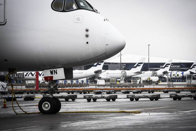 Workers unload a Finnair cargo plane which arrived from China with medical equipment needed against the novel coronavirus at the Helsinki-Vantaa Airport in Vantaa, Finland on April 15, 2020. Vantaa Finland  Copyright: xEmmixKorhonenx LKKTH20200415143012GVVS
