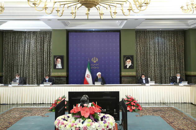 April 15, 2020, Tehran, Iran: A handout photo made available by Iran s Presidential Office shows Iranian President, HASSAN ROUHANI (C), speaks during a cabinet meeting in Tehran, Iran. Rouhani announced that the country will not hold the Islamic Republic of Iran Army Day on 18 April 2020 due to the coronavirus pandemic in the country. Iran said new deaths from the novel coronavirus remained in double figures for the second day in a row, as the country gradually reopens its sanctions-hit economy. Tehran Iran - ZUMAi98_ 20200415_zih_i98_001 Copyright: xIranianxPresidencyx
