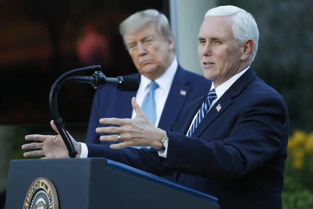 US President Donald J. Trump (L) as US Vice President Mike Pence speaks during the Coronavirus Task Force briefing on the COVID-19 pandemic in the Rose Garden at the White House in Washington, DC, USA, 15 April 2020. Copyright: xPoolxviaxCNPx xMediaPunchx