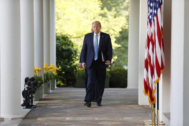 US President Donald J. Trump arrives with Vice President Mike Pence for the Coronavirus Task Force briefing to deliver remarks on the COVID-19 pandemic in the Rose Garden at the White House in Washington, DC, USA, 15 April 2020. Copyright: xPoolxviaxCNPx xMediaPunchx