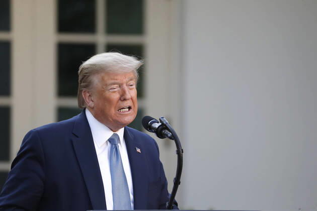 US President Donald J. Trump arrives with Vice President Mike Pence for the Coronavirus Task Force briefing to deliver remarks on the COVID-19 pandemic in the Rose Garden at the White House in Washington, DC, USA, 15 April 2020. Copyright: xPoolxviaxCNPx xMediaPunchx