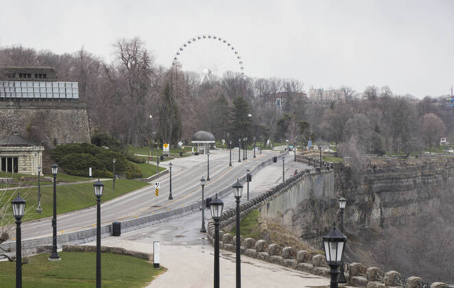 (200415) -- NIAGARA FALLS, April 15, 2020 -- Empty roads are seen in Niagara Falls, Ontario, Canada, on April 15, 2020. Canadian Prime Minister Justin Trudeau announced Wednesday expanded eligibility rules for the Canada Emergency Response Benefit (CERB) so that part-time and seasonal workers can claim the CERB. As of Wednesday afternoon, there were 28,206 confirmed COVID-19 cases and 1,007 deaths across the country. (Photo by Xinhua) CANADA-ONTARIO-NIAGARA FALLS-COVID-19-ECONOMY ZouxZheng 
