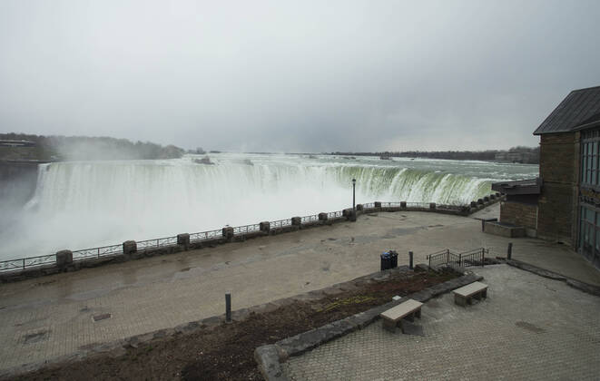 (200415) -- NIAGARA FALLS, April 15, 2020 -- Niagara Falls with no visitors is seen from the Canadian side in Niagara Falls, Ontario, Canada, on April 15, 2020. Canadian Prime Minister Justin Trudeau announced Wednesday expanded eligibility rules for the Canada Emergency Response Benefit (CERB) so that part-time and seasonal workers can claim the CERB. As of Wednesday afternoon, there were 28,206 confirmed COVID-19 cases and 1,007 deaths across the country. (Photo by Xinhua) CANADA-ONTARIO-NIAGARA FALLS-COVID-19-ECONOMY ZouxZheng 