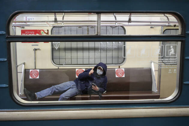 MOSCOW, RUSSIA - APRIL 16, 2020: A man in a train at Rechnoi Vokzal Station of the Moscow Metro amid the self-isolation regime. Sergei Bobylev TASS  TS0D5ED8
