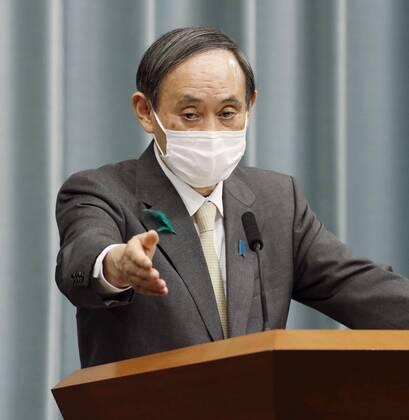 Japan to declare nationwide state of emergency Japanese Chief Cabinet Secretary Yoshihide Suga attends a press conference in Tokyo on April 16, 2020. Prime Minister Shinzo Abe has decided to declare a nationwide state of emergency to contain the spread of the new coronavirus. 
