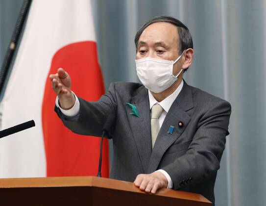 Japan to declare nationwide state of emergency Japanese Chief Cabinet Secretary Yoshihide Suga attends a press conference in Tokyo on April 16, 2020. Prime Minister Shinzo Abe has decided to declare a nationwide state of emergency to contain the spread of the new coronavirus. 