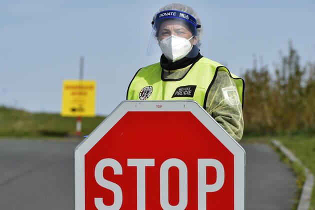 Paramedics take samples for covid-19 tests in drive-through testing station near the Domazlice Hospital, Czech Republic, on Wednesday, April 15, 2020. (CTKxPhoto MiroslavxChaloupka) CTKPhotoP202004150473001 cha018k
