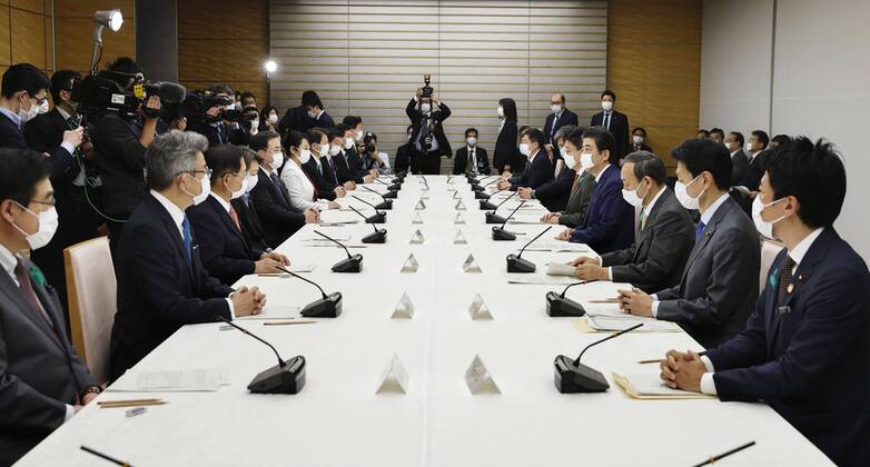 Nationwide state of emergency over coronavirus The Japanese government task force on combating the new coronavirus is convened in Tokyo on April 16, 2020. Prime Minister Shinzo Abe (4th from R) declared a nationwide state of emergency at the meeting. 