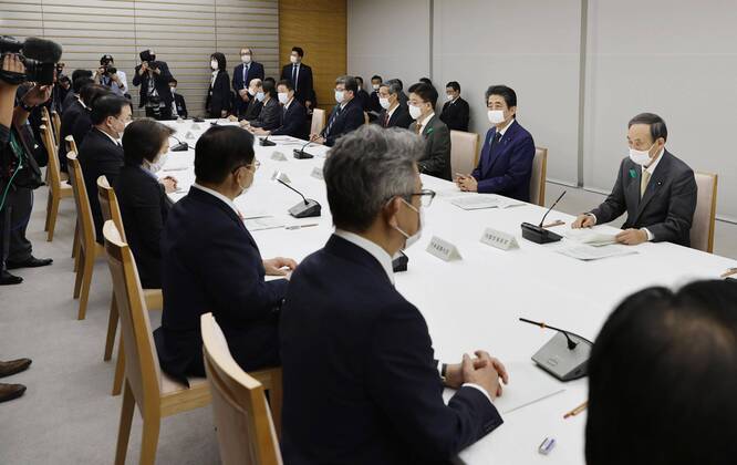 Nationwide state of emergency over coronavirus The Japanese government task force on combating the new coronavirus is convened in Tokyo on April 16, 2020. Prime Minister Shinzo Abe (2nd from R facing camera) declared a nationwide state of emergency at the meeting. 