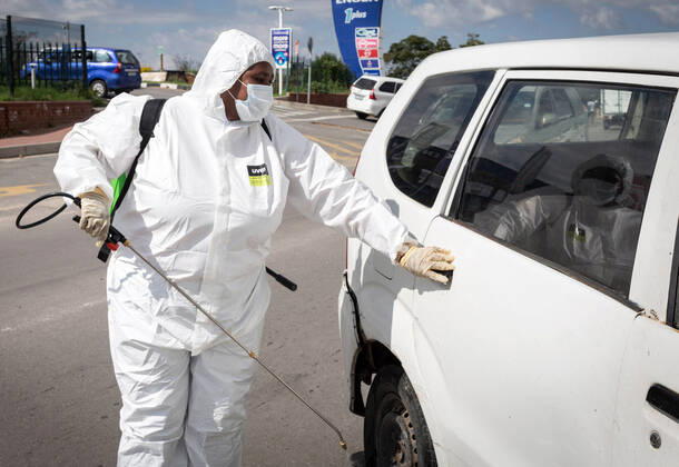(200416) -- JOHANNESBURG, April 16, 2020 (Xinhua) -- A staff member disinfects a car in Johannesburg, South Africa, April 16, 2020. South Africa on Wednesday reported seven more deaths from the novel coronavirus, bringing the death toll to 34. The total number of confirmed cases in the country surged to 2,506, up by 91 from Tuesday s announcement. (Photo by Yeshiel Xinhua) SOUTH AFRICA-JOHANNESBURG-COVID-19 
