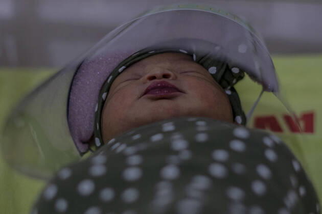 April 16, 2020, Bireuen, Aceh, Indonesia: A newborn baby wearing a face shield as a protective measure amid fears of coronavirus disease COVID-19 at a hospital in Bireuen, Aceh province. Latest reports of COVID-19 cases, Indonesian confirms 5.516 positive cases, 548 recovered with 496 deaths. Bireuen Indonesia - ZUMAm250 20200416_zip_m250_011 Copyright: xZikrixMaulanax