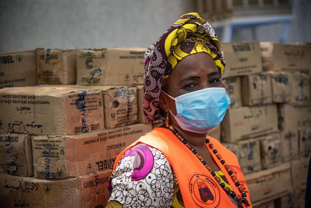 An employee of the technical services of the city of Niamey attends a donation ceremony. Donations from international NGOs (Non-Governmental Organizations) given to the city of Niamey continue to flow in the framework of the COVID-19 Preparation and Response Plan. Donations of sanitary equipment in particular (Soaps, kettles, Masks, ...) as here today given by a German NGO to the mayor and President of the Special Delegation of the city, Mr. Moctar Mamoudou.  NicolasxRemenex xLexPictorium LePictorium_0227994