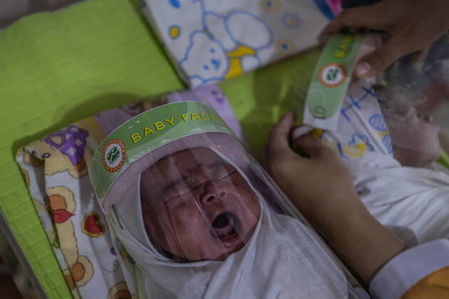 April 16, 2020, Bireuen, Aceh, Indonesia: Newborn babies wearing a face shield as a protective measure amid fears of coronavirus disease COVID-19 at a hospital in Bireuen, Aceh province. Latest reports of COVID-19 cases, Indonesian confirms 5.516 positive cases, 548 recovered with 496 deaths. Bireuen Indonesia - ZUMAm250 20200416_zip_m250_009 Copyright: xZikrixMaulanax