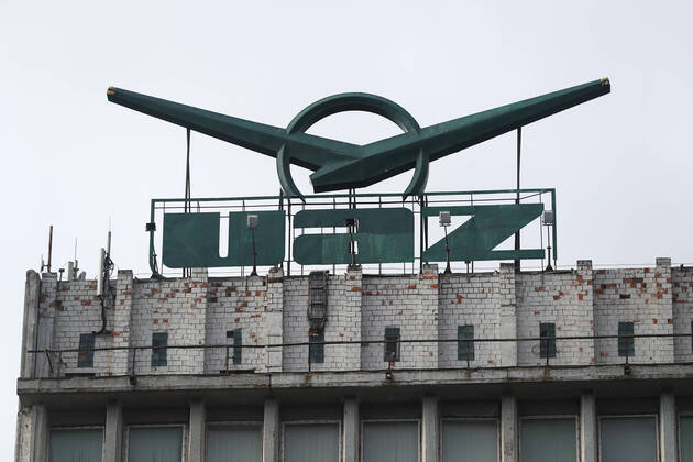 ULYANOVSK, RUSSIA - APRIL 16, 2020: An outside view of the UAZ Ulyanovsk Automobile Plant, a subsidiary of Sollers. UAZ has resumed operation since April 13 in compliance with sanitary regulations; according to a decree by the Ulyanovsk Region government, not more than 25% of the staff, engineering personnel, and office workers are to continue working remotely. Yegor Aleyev TASS  TS0D6036