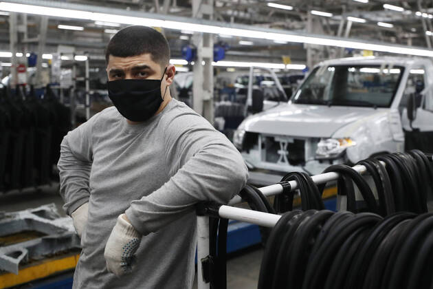 ULYANOVSK, RUSSIA - APRIL 16, 2020: An employee in a shop of the UAZ Ulyanovsk Automobile Plant, a subsidiary of Sollers. UAZ has resumed operation since April 13 in compliance with sanitary regulations; according to a decree by the Ulyanovsk Region government, not more than 25% of the staff, engineering personnel, and office workers are to continue working remotely. Yegor Aleyev TASS  TS0D6039