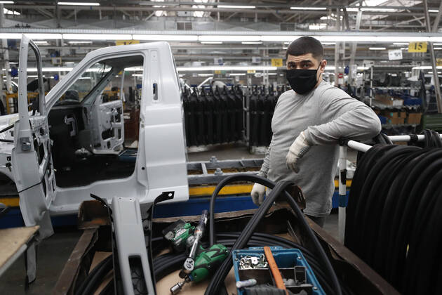 ULYANOVSK, RUSSIA - APRIL 16, 2020: An employee in a shop of the UAZ Ulyanovsk Automobile Plant, a subsidiary of Sollers. UAZ has resumed operation since April 13 in compliance with sanitary regulations; according to a decree by the Ulyanovsk Region government, not more than 25% of the staff, engineering personnel, and office workers are to continue working remotely. Yegor Aleyev TASS  TS0D603A