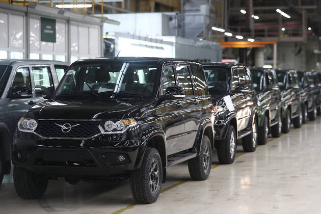ULYANOVSK, RUSSIA - APRIL 16, 2020: UAZ Patriot cars assembled at the UAZ Ulyanovsk Automobile Plant, a subsidiary of Sollers. UAZ has resumed operation since April 13 in compliance with sanitary regulations; according to a decree by the Ulyanovsk Region government, not more than 25% of the staff, engineering personnel, and office workers are to continue working remotely. Yegor Aleyev TASS  TS0D605F