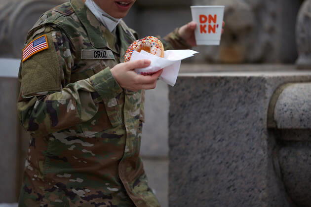 April 16, 2020, Chelsea, Massachusetts, US: The Massachusetts National Guard has responded to the COVID-19, Corona Virus, situation in Chelsea, Massachusetts. Chelsea is a major hot spot, and the hardest hit city in the state. Chelsea is a Latin American immigrant heavy population with 80% of the population being essential workers, such as grocery clerks. The National Guard hands out food to local residents with donations from the Salvation Army. Chelsea US - ZUMAd211 20200416_zap_d211_015 Copyright: xAllisonxDinnerx