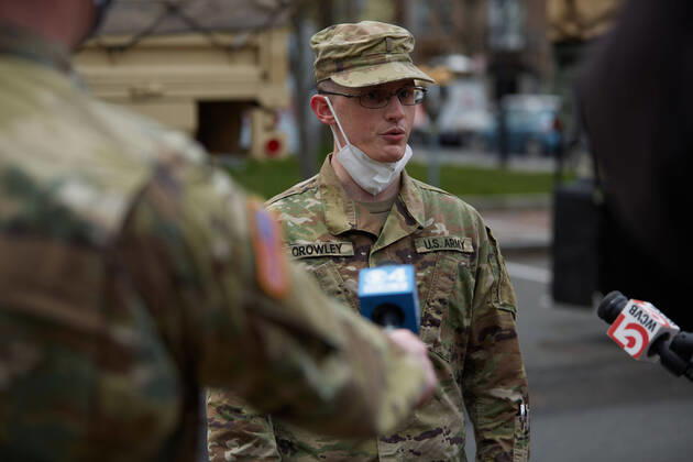 April 16, 2020, Chelsea, Massachusetts, US: The Massachusetts National Guard has responded to the COVID-19, Corona Virus, situation in Chelsea, Massachusetts. Chelsea is a major hot spot, and the hardest hit city in the state. Chelsea is a Latin American immigrant heavy population with 80% of the population being essential workers, such as grocery clerks. The National Guard hands out food to local residents with donations from the Salvation Army. Chelsea US - ZUMAd211 20200416_zap_d211_016 Copyright: xAllisonxDinnerx