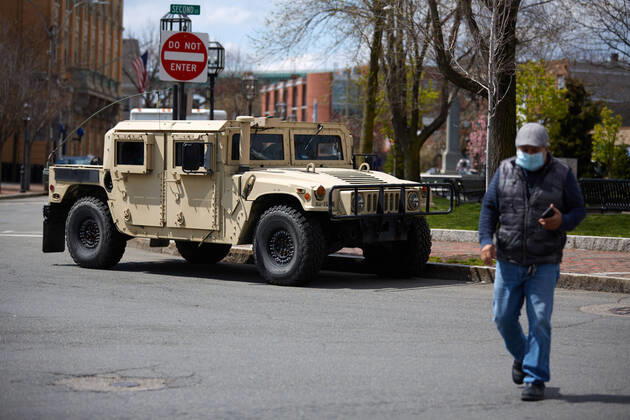April 16, 2020, Chelsea, Massachusetts, US: The Massachusetts National Guard has responded to the COVID-19, Corona Virus, situation in Chelsea, Massachusetts. Chelsea is a major hot spot, and the hardest hit city in the state. Chelsea is a Latin American immigrant heavy population with 80% of the population being essential workers, such as grocery clerks. The National Guard hands out food to local residents with donations from the Salvation Army. Chelsea US - ZUMAd211 20200416_zap_d211_011 Copyright: xAllisonxDinnerx