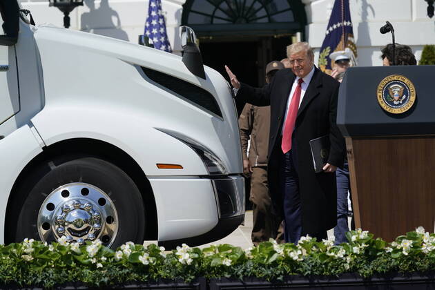 President Donald Trump makes remarks celebrating America s Truckers on the South Lawn of the White House in Washington, DC on Thursday, April 16, 2020. Trunks have stayed on the road to bring the necessary goods to the public during the Covid-19 stay at home orders.  WAX20200416111 ChrisxKleponis