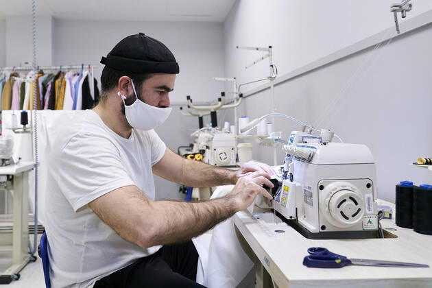 April 16, 2020, Madrid, Spain: A volunteer makes medical gowns at Rey Juan Carlos University in Madrid..A group of teachers at Rey Juan Carlos University volunteer in making face masks and medical gowns to supply hospitals and nursing homes in need of them. Madrid Spain - ZUMAs197 20200416_zaa_s197_157 Copyright: xLeganxP.xMacex