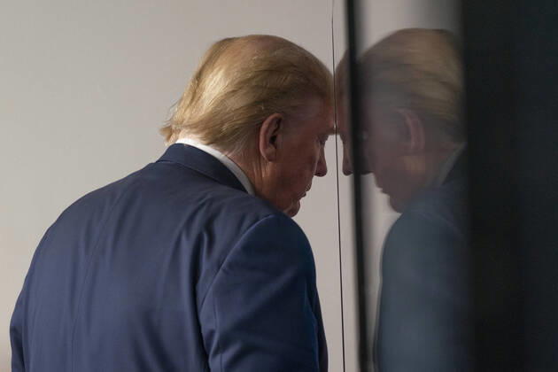 President Donald Trump leaves the Coronavirus Task Force briefing where the guidelines to opening up the United States to business were presented in the Brady Press Briefing Room at the White House in Washington, DC on Thursday, April 16, 2020. More than 31,000 have died in the United States due to the spreading of COVID-19.  WAX20200416182 CHRISxKLEPONIS