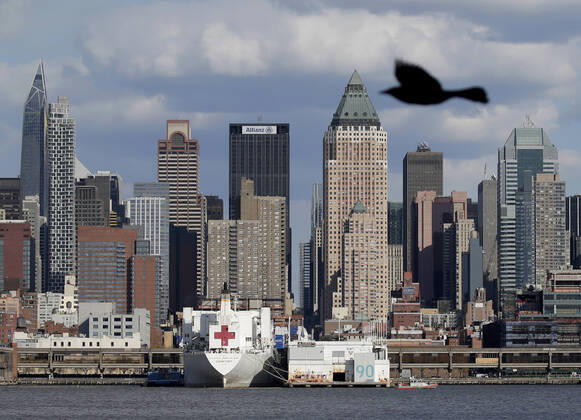 The USNS Comfort Navy ship remains docked at Pier 90 in New York City on Thursday, April 16, 2020. The USNS Comfort was originally designed to save lives in areas of war is now treating COVID-19 patients to help reduce the strain and pressure placed on the hospitals of New York City.  NYP20200416109 JOHNxANGELILLO