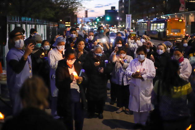 April 16, 2020, New York, New York, United States: Candlelight vigil at the Elmhurst Hospital Center in Queens, New York, during a COVID-19 coronavirus pandemic in the United States. New York United States - ZUMAv122 20200416_zap_v122_056 Copyright: xWilliamxVolcovx