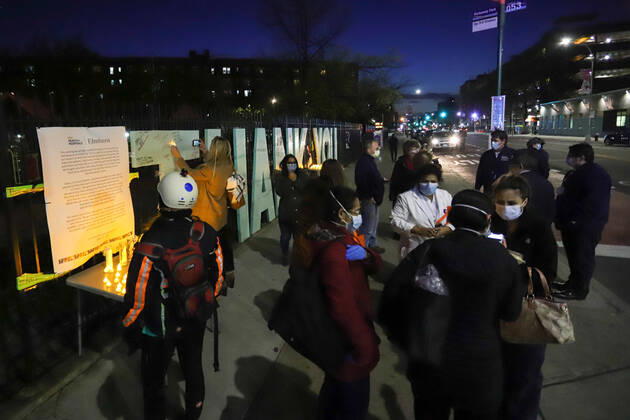 April 16, 2020, New York, New York, United States: Candlelight vigil at the Elmhurst Hospital Center in Queens, New York, during a COVID-19 coronavirus pandemic in the United States. New York United States - ZUMAv122 20200416_zap_v122_092 Copyright: xWilliamxVolcovx