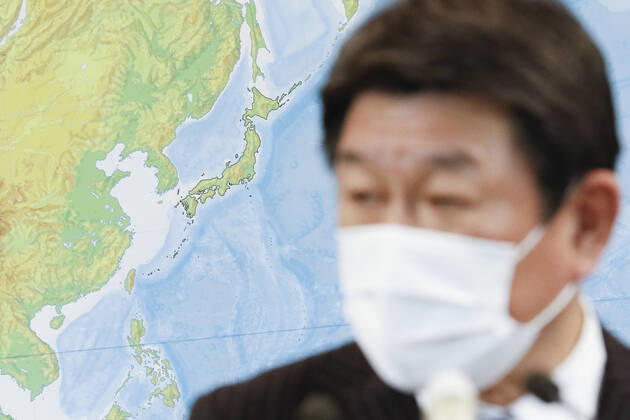 April 17, 2020, Tokyo, Japan: Japan s Foreign Minister Toshimitsu Motegi wearing a face mask speaks during his regular news conference at the Ministry of Foreign Affairs of Japan Tokyo Japan - ZUMAm191 20200417_zap_m191_009 Copyright: xRodrigoxReyesxMarinx