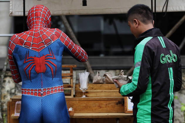 Spiderman shares food with others, amid the COVID-19 Pandemic in Indonesia - 17 April 2020. A man wearing a Spiderman costume distributes food in Yogyakarta, Friday, April 17, 2020. Food and mineral water are given to the community as a form of caring for others, amid the Pandemic COVID-19 in Indonesia. (Photo by Devi Rahman INA Photo Agency imago images) 